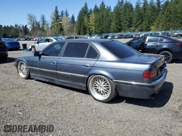 2001 BMW 7 Series 740iL with VIN WBAGH83401DP20569, listed as a Copart auction lot 52725335 with 152,575 mi miles and Salvage Title. Bid and sale history available at carsss.com. Image 2.