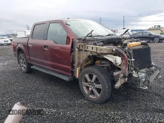 2015 Ford F-150 XLT with VIN 1FTEW1EF2FFA17900, listed as a IAAI auction lot 40927904 with 119,105 mi miles. Bid and sale history available at carsss.com. Image 1.
