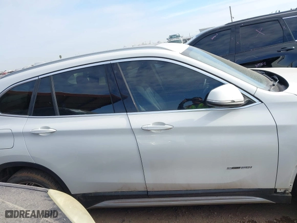 2018 BMW X1 sDrive28i with VIN WBXHU7C32J5H41587, listed as a IAAI auction lot 41538394 with 125,804 mi miles. Bid and sale history available at carsss.com. Image 14.