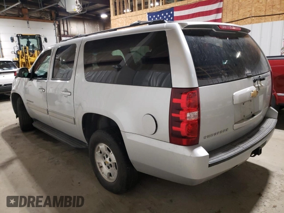 2013 Chevrolet Suburban LS with VIN 1GNSKHE72DR263672, listed as a Copart auction lot 87855905 with 124,081 mi miles and Salvage Title. Bid and sale history available at carsss.com. Image 2.