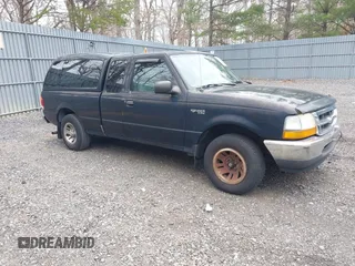 1999 Ford Ranger XL with VIN 1FTYR14V5XPB00021, listed as a IAAI auction lot 41899747 with 180,954 mi miles. Bid and sale history available at carsss.com. Image 1.