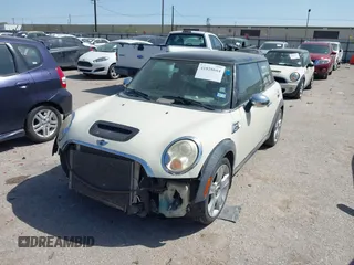 2007 MINI Hardtop S with VIN WMWMF73527TT82098, listed as a IAAI auction lot 41828664 with 107,418 mi miles and . Bid and sale history available at DreamBid. Image 2.