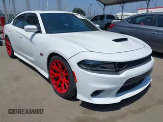 2019 Dodge Charger Scat Pack z VIN 2C3CDXGJXKH520282, wystawiony jako IAAI lot #42446424 z przebiegiem 46 261 mil mil oraz . Historia ofert i sprzedaży dostępna na DreamBid. Obrazek 1.
