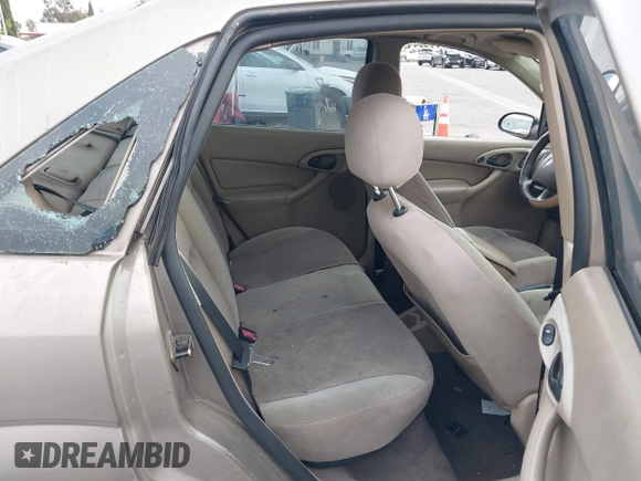 2003 Ford Focus SE z VIN 1FAFP34Z73W236474, wystawiony jako IAAI lot #39378102 z przebiegiem 183 280 mil mil oraz . Historia ofert i sprzedaży dostępna na DreamBid. Obrazek 8.