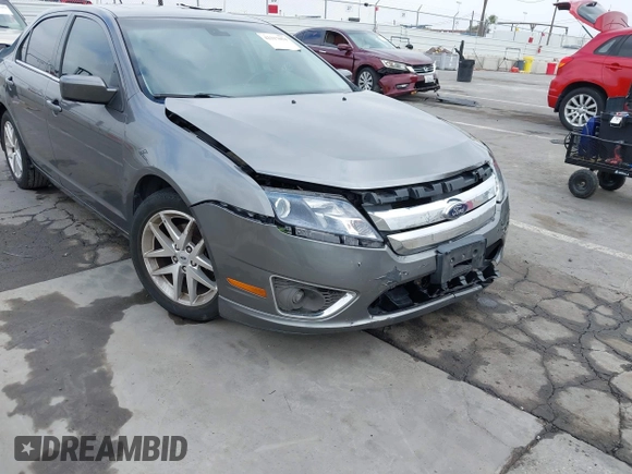 2012 Ford Fusion SEL z VIN 3FAHP0JA1CR144687, wystawiony jako IAAI lot #42317054 z przebiegiem 173 134 mil mil oraz . Historia ofert i sprzedaży dostępna na DreamBid. Obrazek 6.