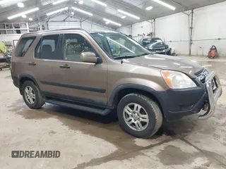 2004 Honda CR-V EX with VIN JHLRD78814C057877, listed as a IAAI auction lot 42065687 with 220,207 mi miles and . Bid and sale history available at carsss.com. Image 1.