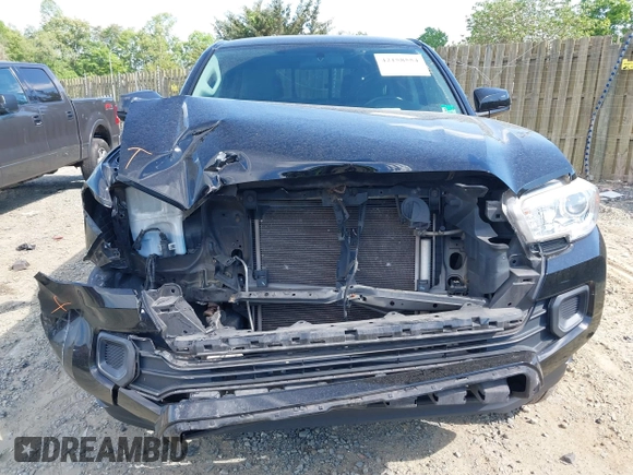 2016 Toyota Tacoma SR5 with VIN 5TFAX5GN4GX060296, listed as a IAAI auction lot 42158554 with 219,859 mi miles and . Bid and sale history available at DreamBid. Image 12.