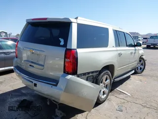 2016 Chevrolet Suburban LTZ with VIN 1GNSKJKC6GR279483, listed as a IAAI auction lot 41973085 with 171,176 mi miles and . Bid and sale history available at DreamBid. Image 4.