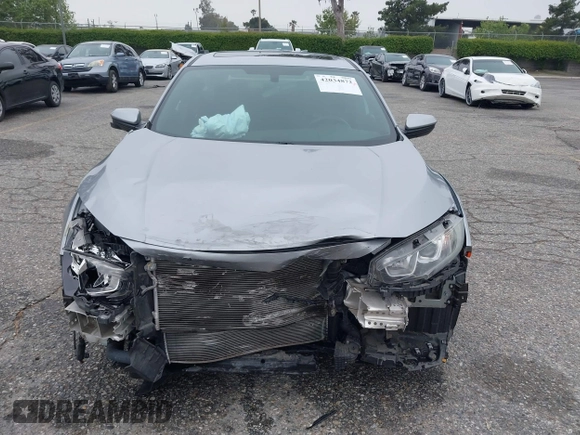 2018 Honda Civic Si with VIN 2HGFC1E50JH708274, listed as a IAAI auction lot 42034872 with 48,551 mi miles and . Bid and sale history available at DreamBid. Image 12.