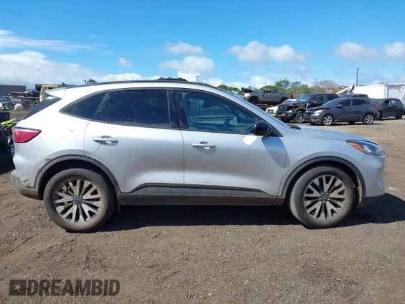 2020 Ford Escape SE Sport Hybrid with VIN 1FMCU0BZ3LUB70892, listed as a IAAI auction lot 41647671 with 38,691 mi miles and . Bid and sale history available at carsss.com. Image 12.