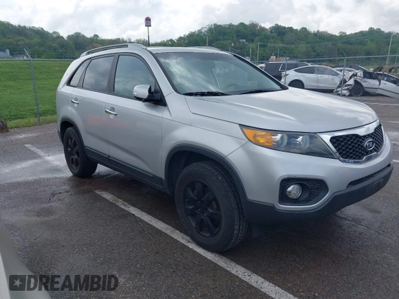 2011 Kia Sorento LX with VIN 5XYKT4A14BG074310, listed as a IAAI auction lot 42119815 with 215,660 mi miles. Bid and sale history available at carsss.com. Image 1.
