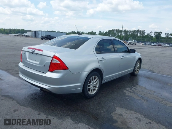 2012 Ford Fusion S with VIN 3FAHP0GAXCR270957, listed as a IAAI auction lot 42122294 with 230,489 mi miles and . Bid and sale history available at carsss.com. Image 4.