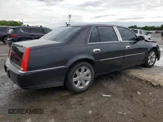 2007 Cadillac DTS V8 z VIN 1G6KD57Y27U179010, wystawiony jako Copart lot #54055605 z przebiegiem 137 326 mil mil oraz Szkoda całkowita • Salvage title. Historia ofert i sprzedaży dostępna na DreamBid. Obrazek 3.