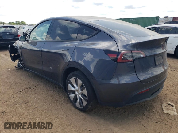 2022 Tesla Model Y Long Range with VIN 7SAYGDEE3NA007737, listed as a Copart auction lot 64602984 with 42,597 mi miles and Salvage Title. Bid and sale history available at carsss.com. Image 2.