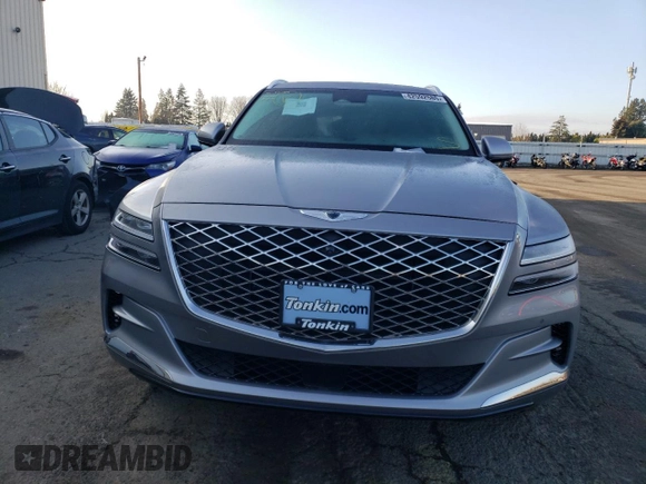 2023 Genesis GV80 with VIN KMUHCESC9PU107157, listed as a Copart auction lot 42592585 with 11,396 mi miles and Salvage title. Bid and sale history available at DreamBid. Image 5.