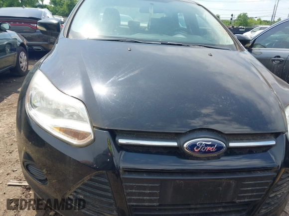 2013 Ford Focus SE z VIN 1FADP3F27DL183754, wystawiony jako IAAI lot #42677654 z przebiegiem 117 966 mil mil oraz . Historia ofert i sprzedaży dostępna na DreamBid. Obrazek 11.