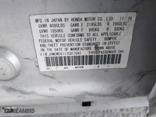 2007 Honda Accord Sdn VP with VIN JHMCM56117C017041, listed as a IAAI auction lot 42033947 with 231,586 mi miles. Bid and sale history available at carsss.com. Image 9.