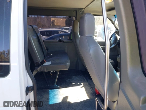 2010 Ford Econoline Cargo Commercial with VIN 1FTNE2EW7ADA24421, listed as a IAAI auction lot 41693968 with 128,836 mi miles and . Bid and sale history available at DreamBid. Image 8.
