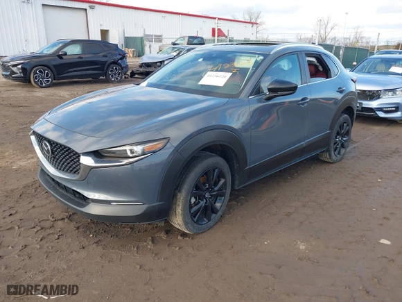 2022 Mazda CX-30 2.5 S Preferred Package with VIN 3MVDMBCL3NM422497, listed as a IAAI auction lot 41236220 with 57,752 mi miles. Bid and sale history available at carsss.com. Image 2.