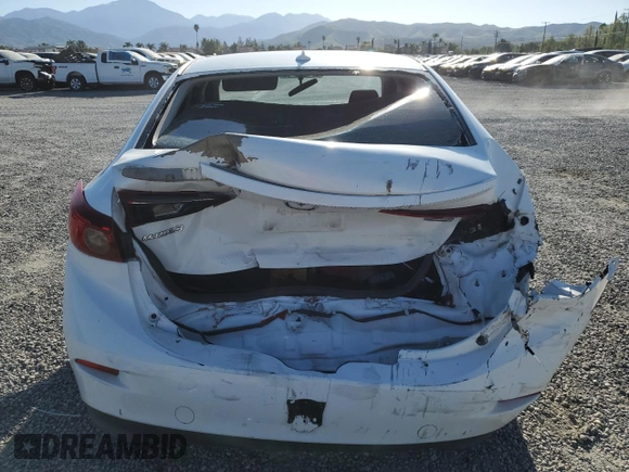 2015 Mazda 3 i Touring with VIN JM1BM1V70F1265495, listed as a Copart auction lot 52867345 with 154,496 mi miles and Salvage Title. Bid and sale history available at DreamBid. Image 6.