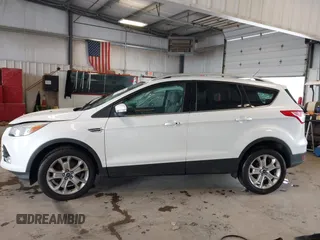 2016 Ford Escape Titanium with VIN 1FMCU9J90GUA18743, listed as a IAAI auction lot 42419730 with 102,666 mi miles and . Bid and sale history available at DreamBid. Image 15.