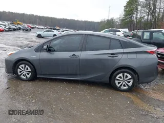 2017 Toyota Prius Two z VIN JTDKARFU9H3046747, wystawiony jako IAAI lot #41773391 z przebiegiem 148 728 mil mil oraz . Historia ofert i sprzedaży dostępna na DreamBid. Obrazek 14.