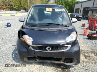 2013 Smart fortwo Pure with VIN WMEEJ3BA9DK670264, listed as a Copart auction lot 52817215 with 51,434 mi miles and Salvage Title. Bid and sale history available at DreamBid. Image 5.