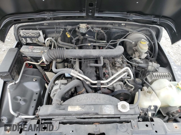 2004 Jeep Wrangler Sahara with VIN 1J4FA59SX4P713343, listed as a Copart auction lot 53608265 with 113,828 mi miles and Salvage title. Bid and sale history available at DreamBid. Image 11.