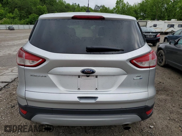 2014 Ford Escape SE with VIN 1FMCU9GX8EUC48467, listed as a Copart auction lot 57269155 with 148,611 mi miles and Salvage title. Bid and sale history available at DreamBid. Image 6.