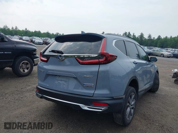 2021 Honda CR-V Touring with VIN 7FART6H91ME022993, listed as a IAAI auction lot 42439344 with 30,477 mi miles and . Bid and sale history available at DreamBid. Image 4.