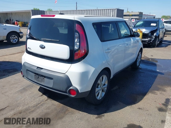 2014 Kia Soul + with VIN KNDJP3A58E7036528, listed as a IAAI auction lot 42014997 with 156,853 mi miles. Bid and sale history available at carsss.com. Image 4.