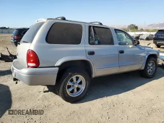 2000 Dodge Durango z VIN 1B4HR28Y4YF278422, wystawiony jako Copart lot #69119144 z przebiegiem 156 012 mil mil oraz Szkoda całkowita • Salvage title. Historia ofert i sprzedaży dostępna na DreamBid. Obrazek 3.