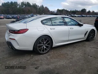 2020 BMW 8 Series M850i z VIN WBAGV8C01LBP48692, wystawiony jako Copart lot #52019305 z przebiegiem Nie podano mil oraz Szkody całkowita. Historia ofert i sprzedaży dostępna na DreamBid. Obrazek 3.