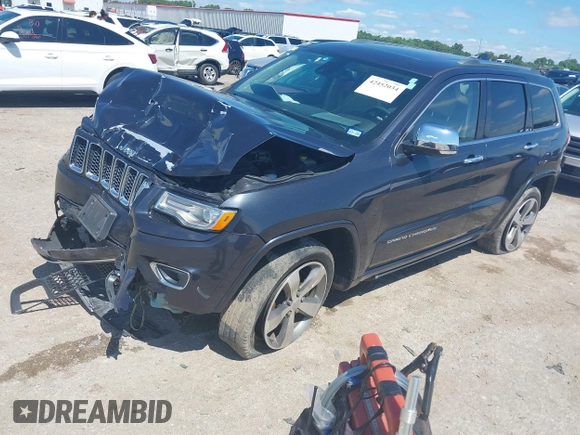 2015 Jeep Grand Cherokee High Altitude with VIN 1C4RJFCG5FC807394, listed as a IAAI auction lot 42452034 with 72,011 mi miles and . Bid and sale history available at DreamBid. Image 18.