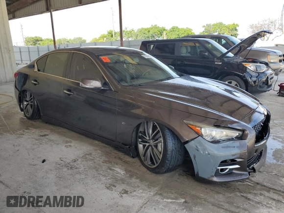 2015 Infiniti Q50 with VIN JN1BV7AP4FM335961, listed as a Copart auction lot 61829295 with 130,327 mi miles and Salvage title. Bid and sale history available at DreamBid. Image 4.