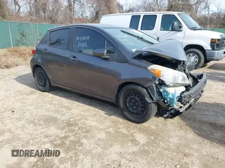 2012 Toyota Yaris L with VIN JTDKTUD33CD532139, listed as a IAAI auction lot 41789697 with 173,706 mi miles. Bid and sale history available at carsss.com. Image 1.
