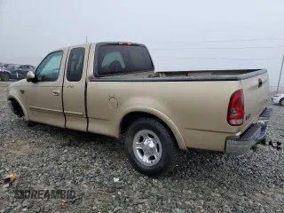 1999 Ford F-150 XL with VIN 1FTRX18L7XNB64656, listed as a Copart auction lot 84610454 with 0 mi miles and Salvage Title. Bid and sale history available at carsss.com. Image 2.