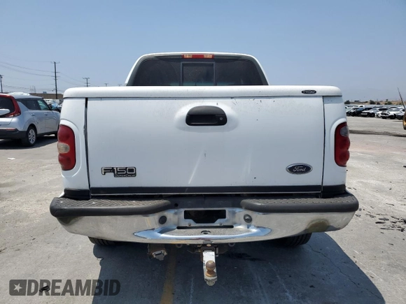 2001 Ford F-150 XLT с VIN 1FTRW07L01KF51010, выставлен на аукционе Copart как лот 59157985 с пробегом Не указан миль и Списание • Salvage title. История ставок и продаж доступна на DreamBid. Изображение 6.