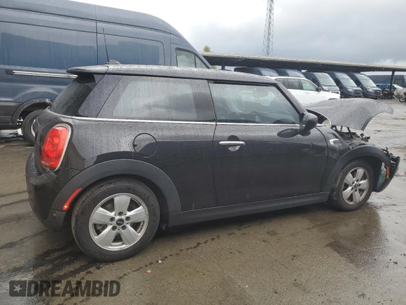 2021 MINI Hardtop Cooper с VIN WMWXR3C06M2N12998, выставлен на аукционе Copart как лот 79142464 с пробегом 44 825 миль миль и Списание • Salvage title. История ставок и продаж доступна на DreamBid. Изображение 3.