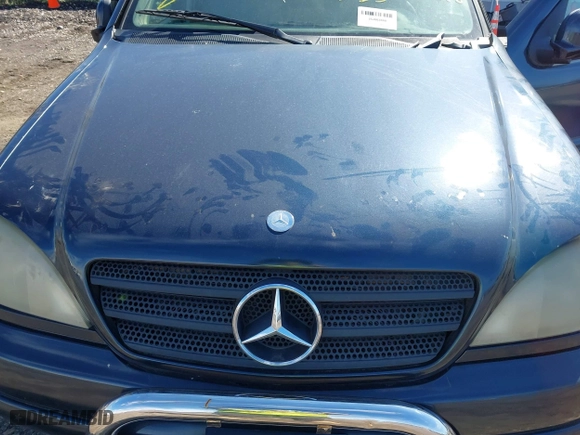 2000 Mercedes-Benz M-Class with VIN 4JGAB54E8YA148786, listed as a IAAI auction lot 41831892 with 999,999 mi miles. Bid and sale history available at carsss.com. Image 10.