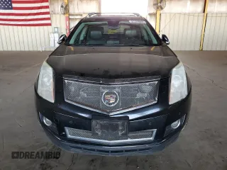 2012 Cadillac SRX Premium Collection z VIN 3GYFNFE30CS599863, wystawiony jako Copart lot #61249995 z przebiegiem 144 740 mil mil oraz Czysty tytuł • Clean title. Historia ofert i sprzedaży dostępna na DreamBid. Obrazek 5.