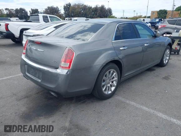 2011 Chrysler 300 Limited with VIN 2C3CA5CG6BH580860, listed as a IAAI auction lot 42054588 with 168,709 mi miles. Bid and sale history available at carsss.com. Image 4.