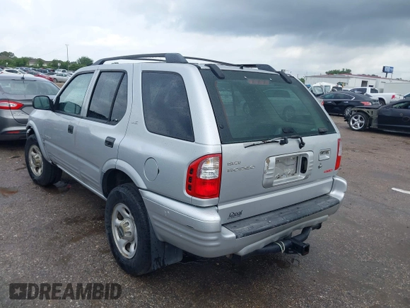 2001 Isuzu Rodeo S with VIN 4S2DM58WX14352481, listed as a IAAI auction lot 42152621 with 162,696 mi miles. Bid and sale history available at carsss.com. Image 3.