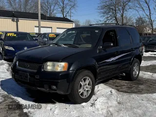2004 Ford Escape Limited with VIN 1FMCU94144KA88842, listed as a IAAI auction lot 41643194 with 148,082 mi miles. Bid and sale history available at carsss.com. Image 2.