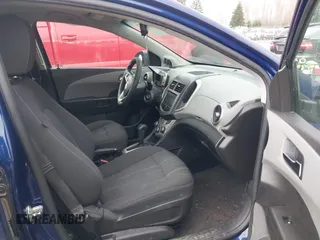 2013 Chevrolet Sonic LT with VIN 1G1JC6SB0D4205841, listed as a IAAI auction lot 41360755 with 137,150 mi miles. Bid and sale history available at carsss.com. Image 5.