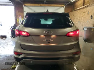2017 Hyundai Santa Fe 2.4L z VIN 5XYZUDLBXHG415400, wystawiony jako Copart lot #58330205 z przebiegiem 116 196 mil mil oraz Szkoda całkowita • Salvage title. Historia ofert i sprzedaży dostępna na DreamBid. Obrazek 6.