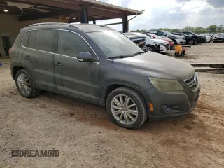 2011 Volkswagen Tiguan S with VIN WVGAV7AX0BW558615, listed as a Copart auction lot 51832635 with Not provided miles and Clean title. Bid and sale history available at DreamBid. Image 4.
