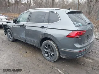 2022 Volkswagen Tiguan SE with VIN 3VV2B7AX4NM126181, listed as a IAAI auction lot 41955274 with 51,456 mi miles. Bid and sale history available at carsss.com. Image 3.