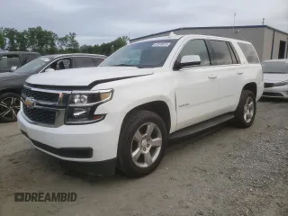 2019 Chevrolet Tahoe LT with VIN 1GNSCBKC5KR356226, listed as a Copart auction lot 57574615 with 82,703 mi miles and Salvage title. Bid and sale history available at DreamBid. Image 1.