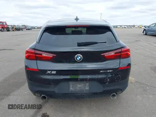 2020 BMW X2 xDrive28i with VIN WBXYJ1C02L5R71755, listed as a IAAI auction lot 41957012 with 69,997 mi miles. Bid and sale history available at carsss.com. Image 17.